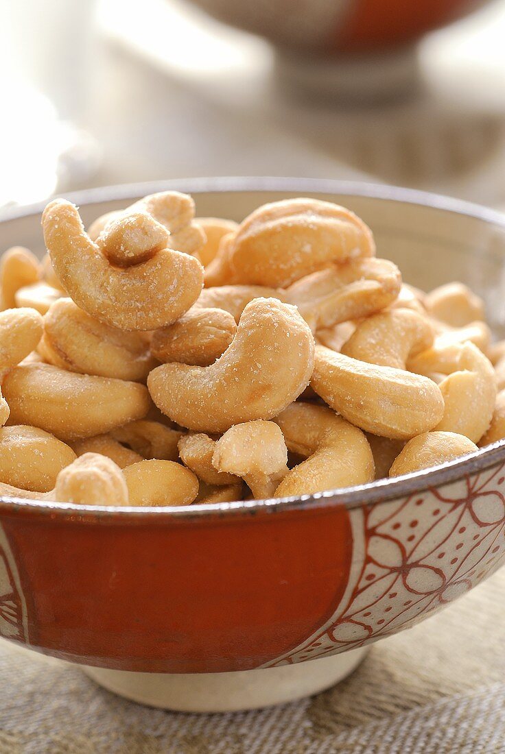 Salted cashew nuts in a small bowl