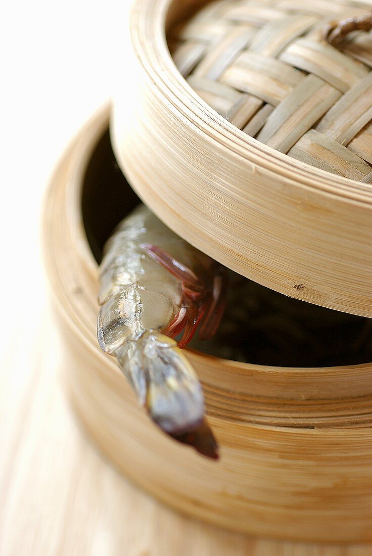 Bamboo steaming basket with shrimp