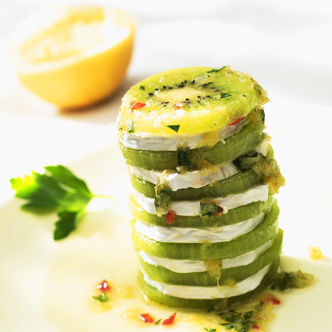 Spicy kiwi fruit and soft cheese tower
