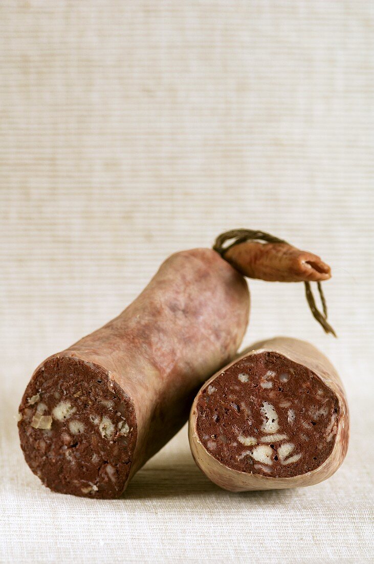 A halved Blutwurst (German black pudding)