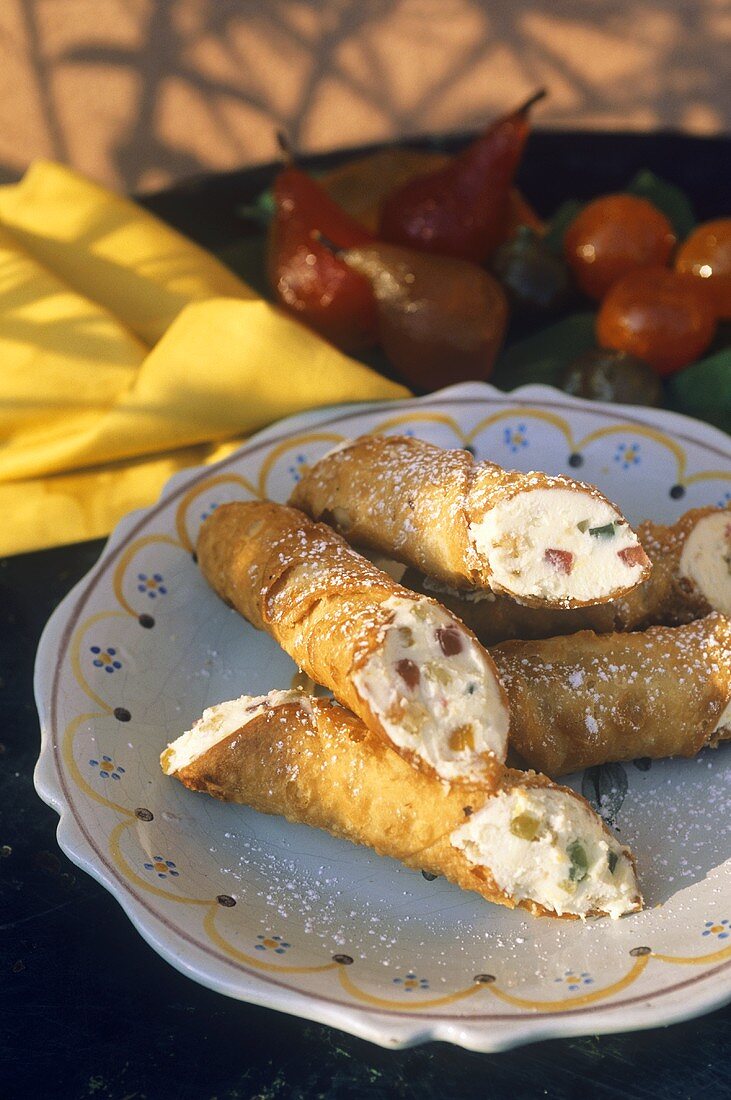 Cannoli (Pastry rolls filled with ricotta cream, Italy)