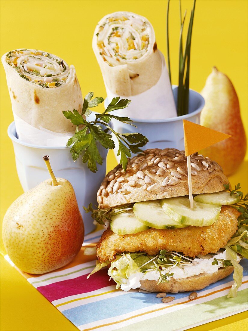 Chicken burger, wraps and pears