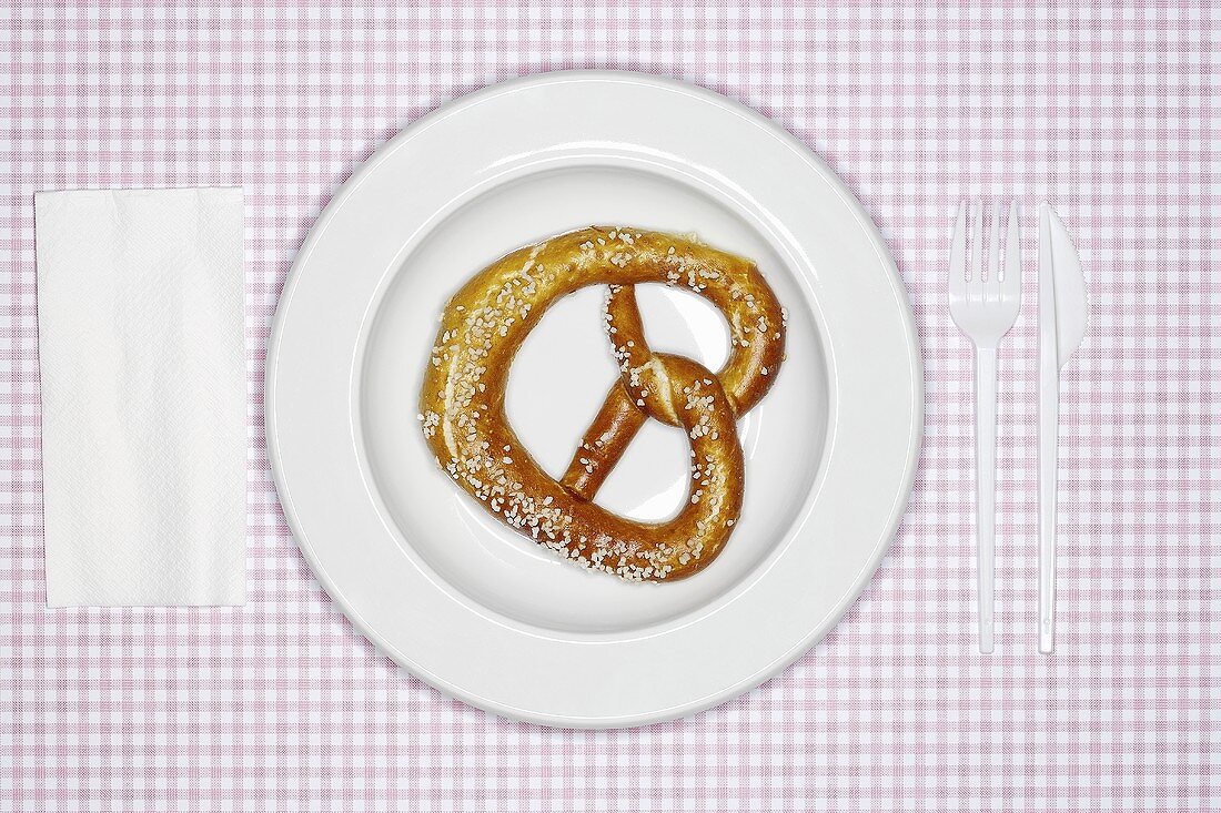 A pretzel on a plate