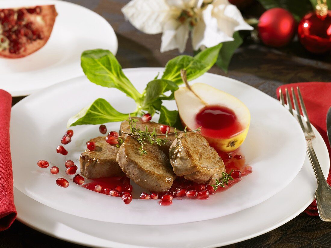 Wild boar medallions with pomegranate sauce