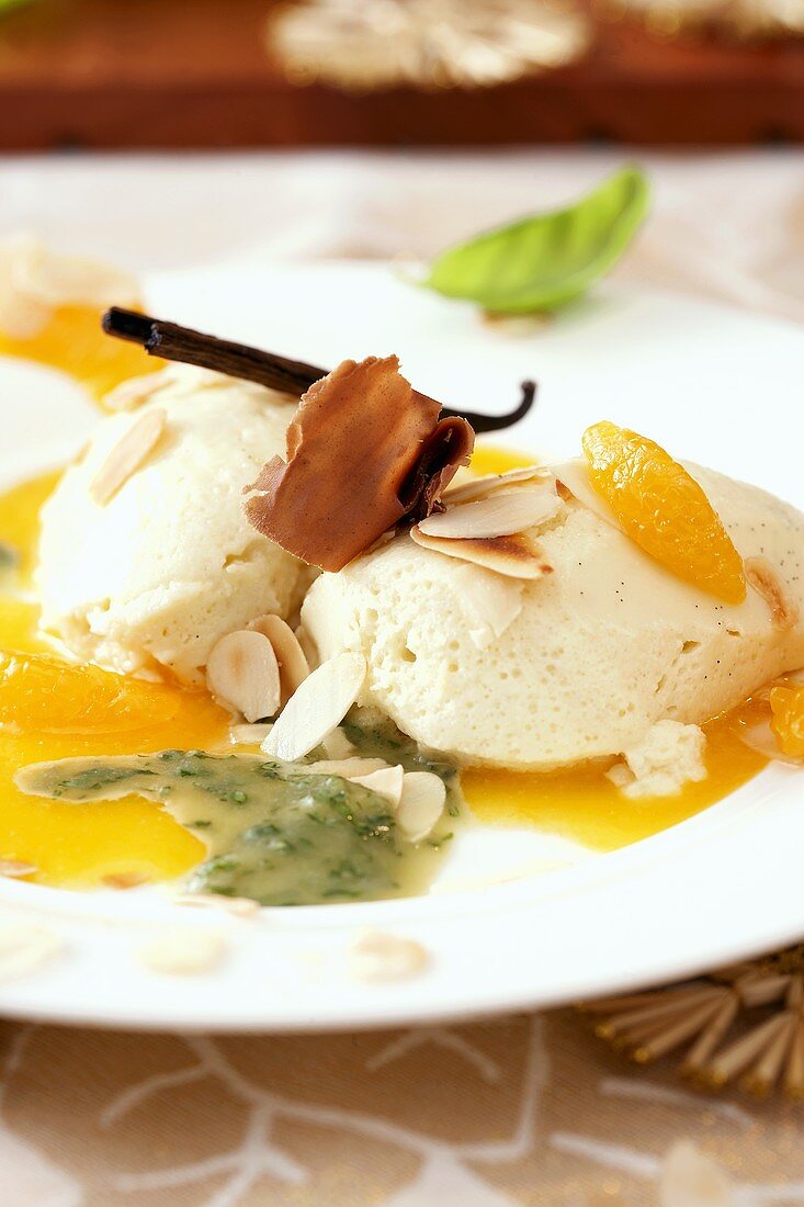 Marzipan mousse with orange sauce