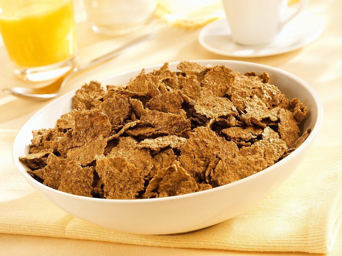 Whole wheat cereal flakes in a dish