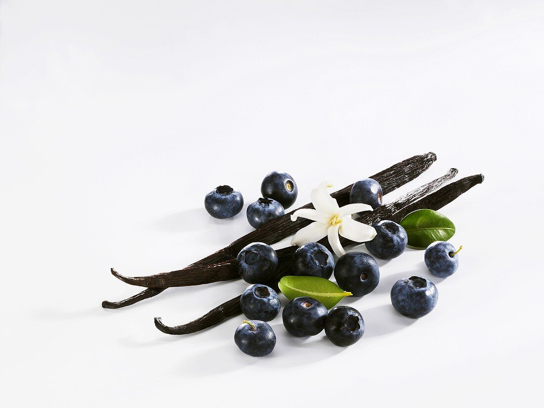 Vanilla pods and blueberries