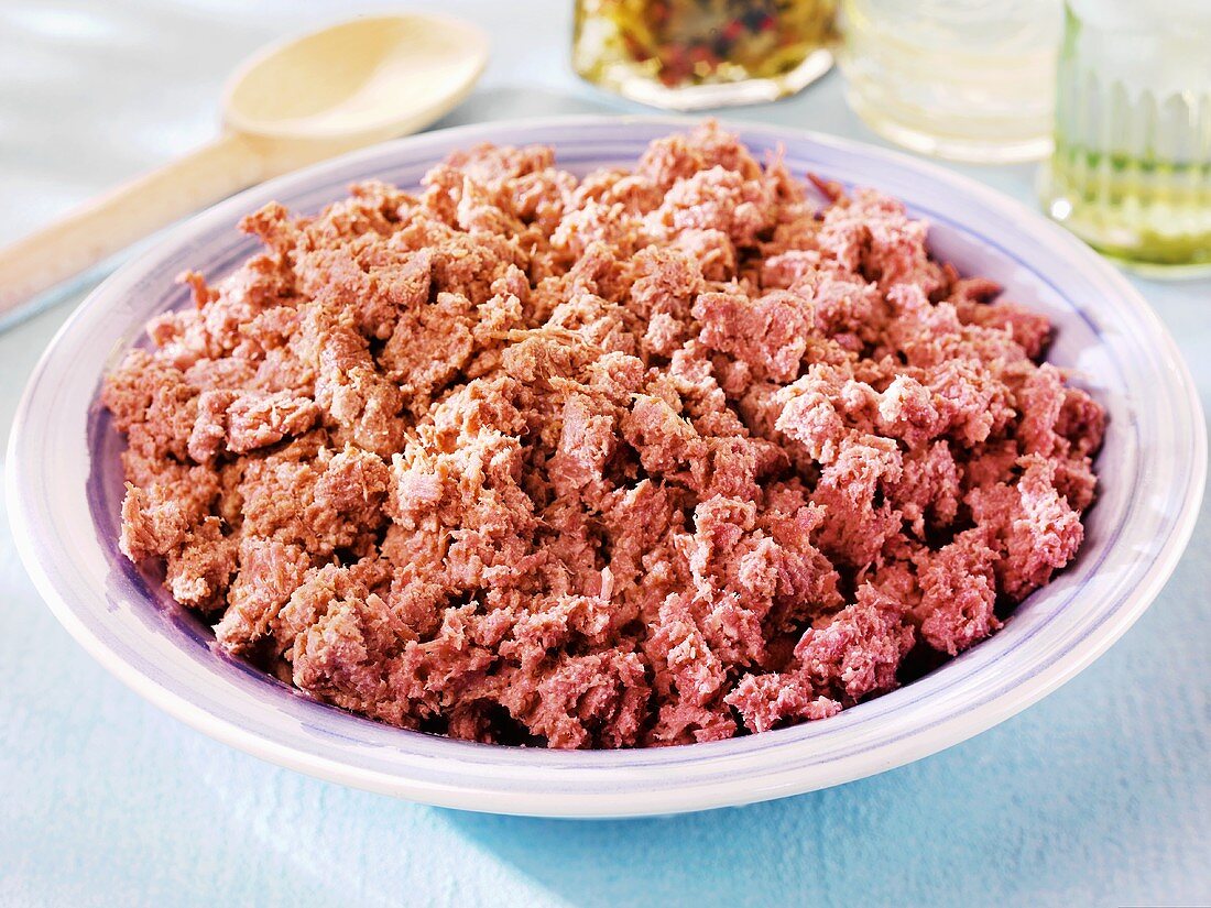 Crumbled corned beef in a dish