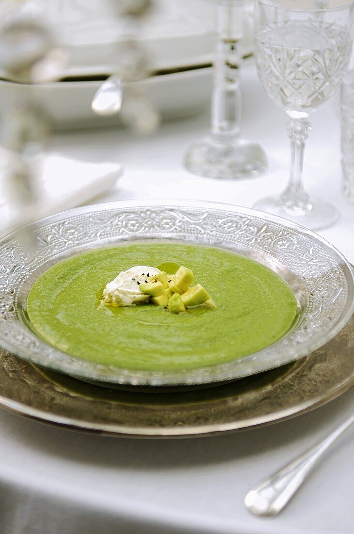 Cold avocado soup with goat's cheese