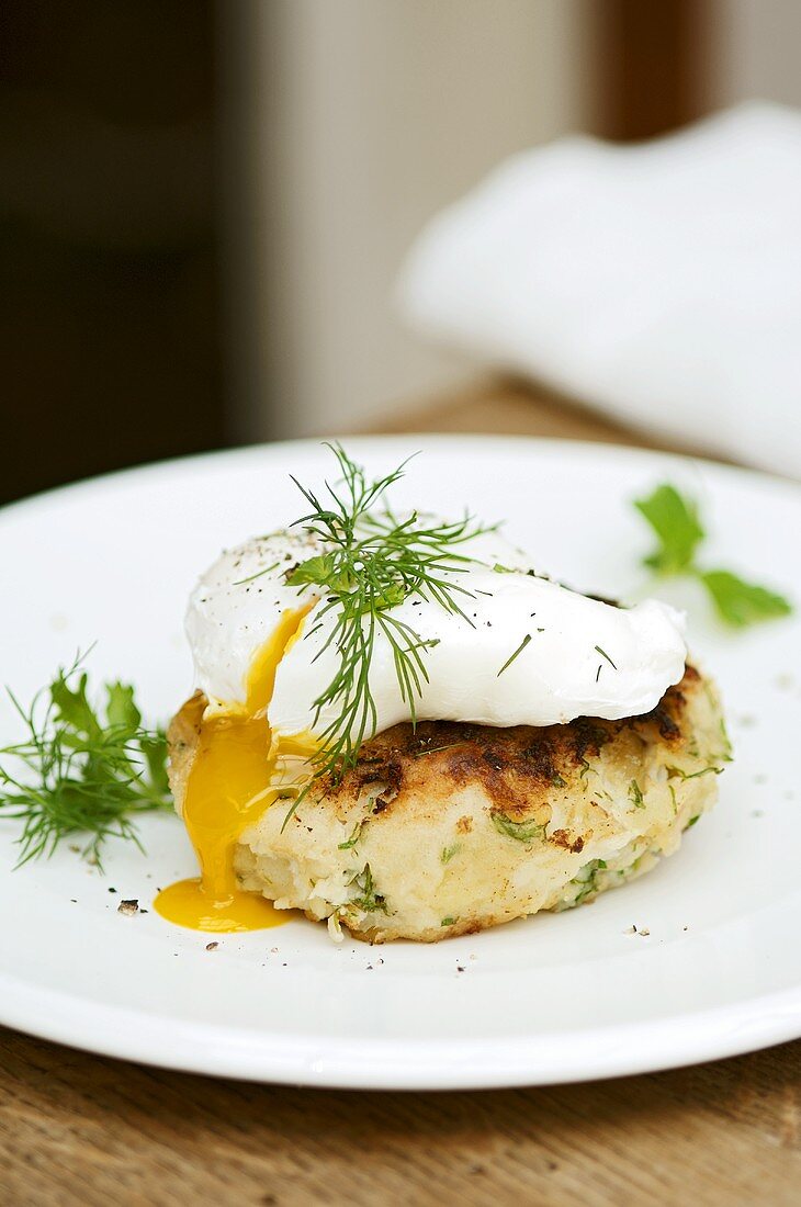 Fish cake (with potato and haddock) with poached egg