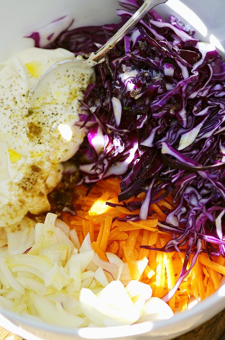 Ingredients for red cabbage salad in a bowl