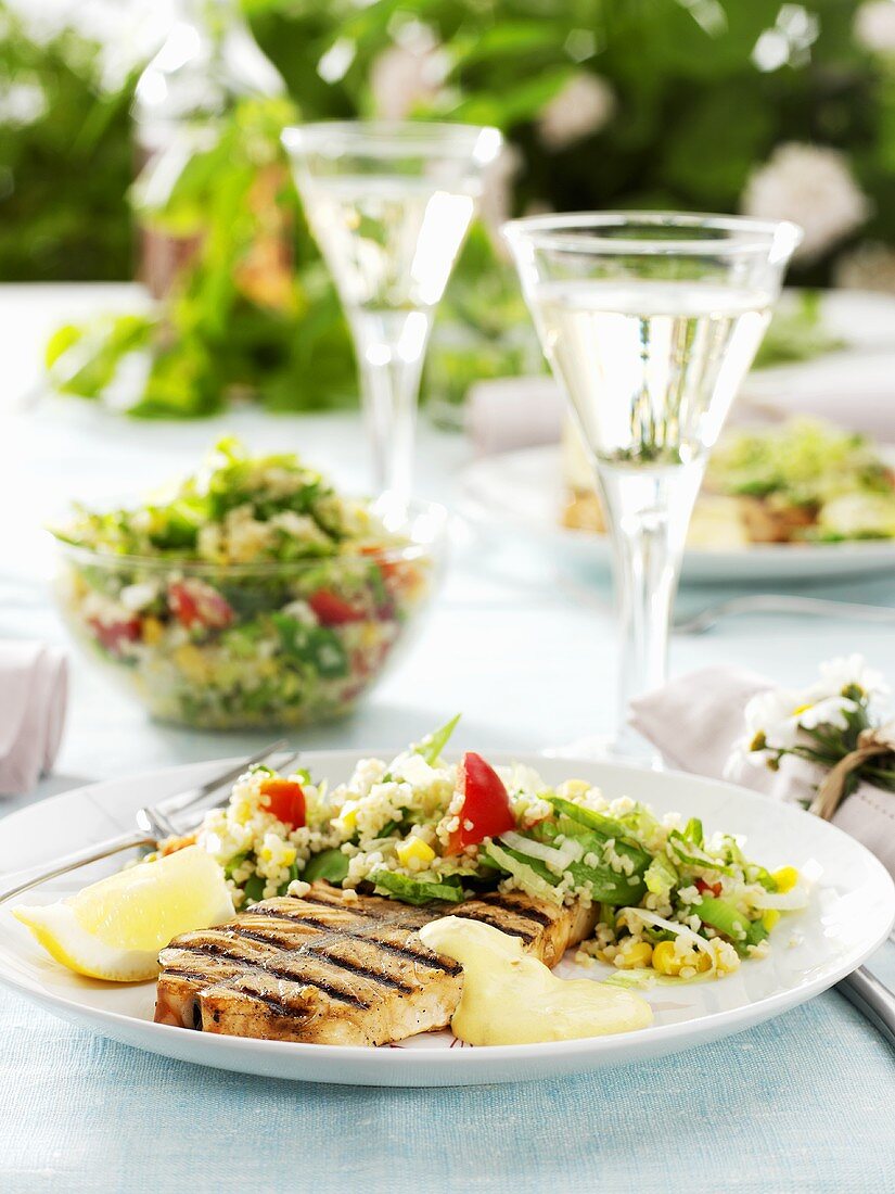 Grilled salmon cutlet with couscous salad