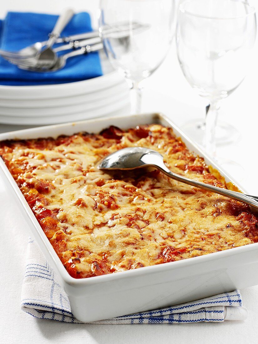 Baked canneloni in the baking dish