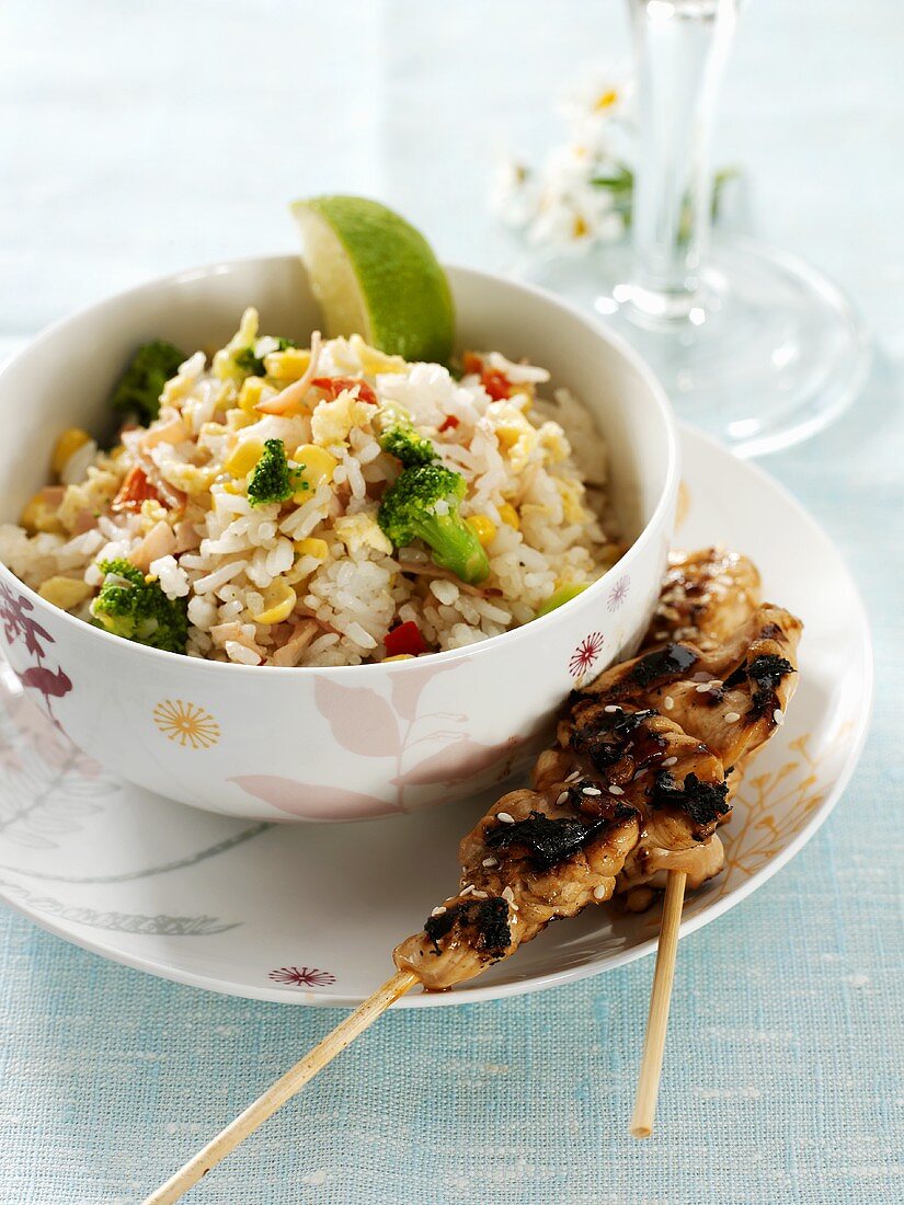 Chicken skewers with rice salad