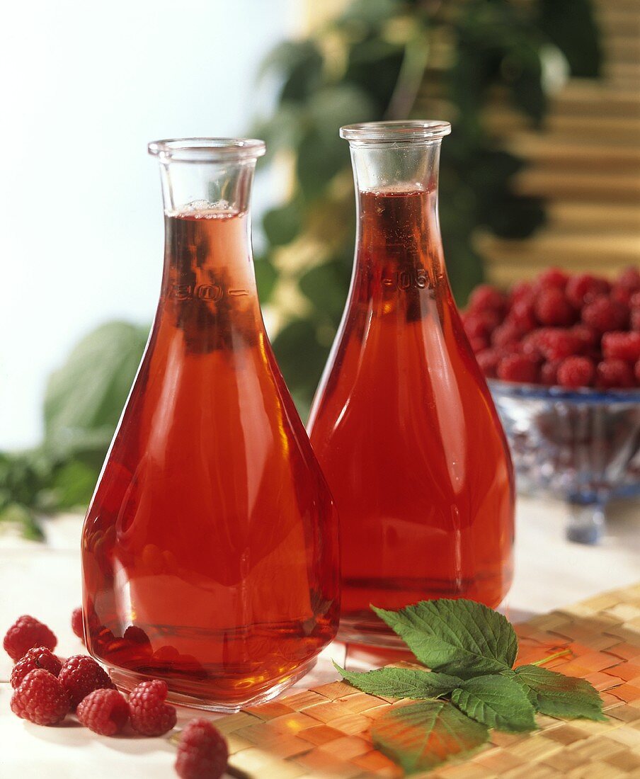 Two bottles of raspberry juice