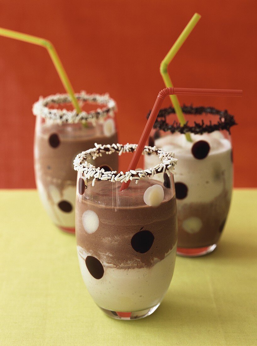 Chocolate and vanilla milk with straws