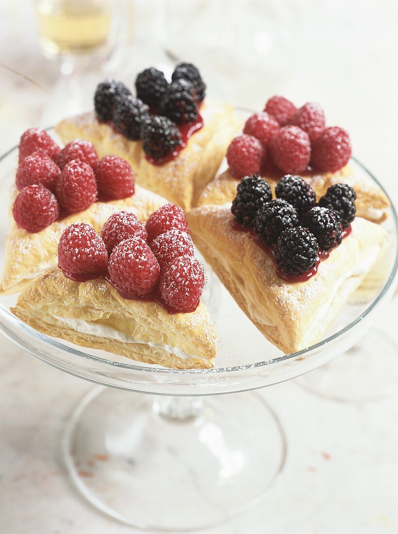 Puff pastry turnovers with raspberries and blackberries