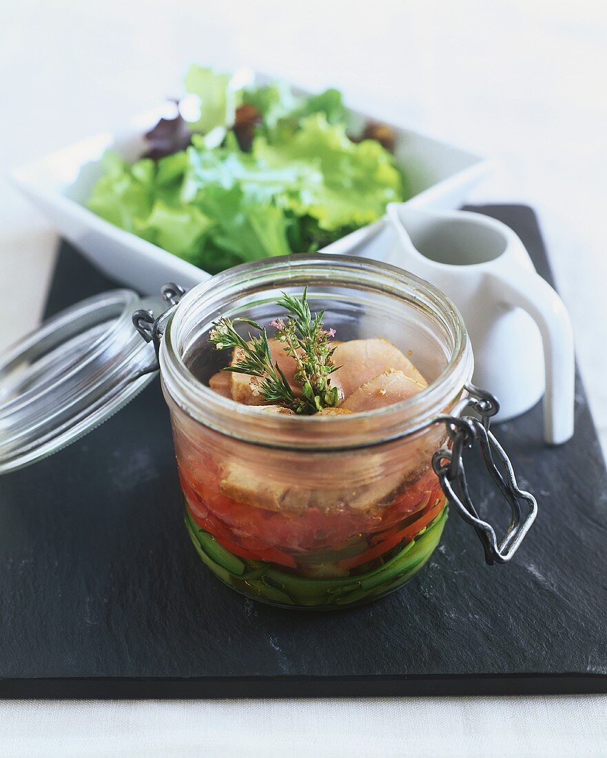 Jellied veal and vegetables in preserving jar
