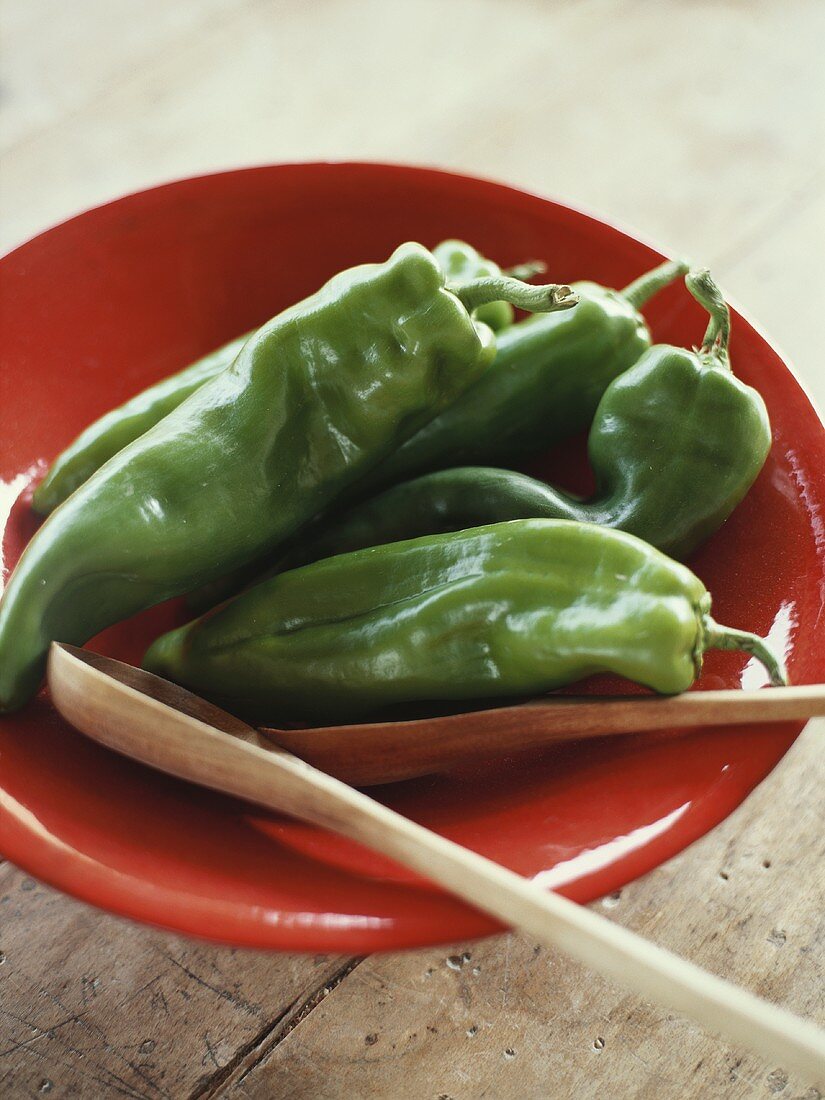 Green pointed peppers on a plate