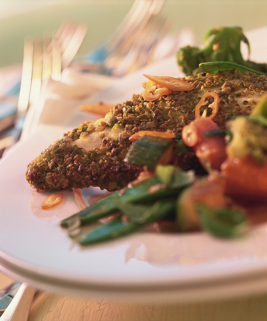 Chicken breast with pistachio crust & marinated vegetables