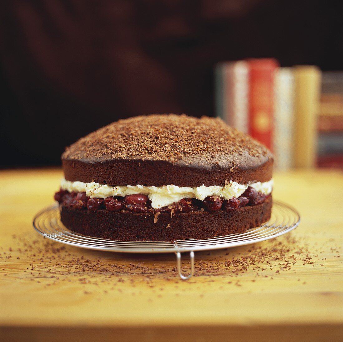 Chocolate cherry cake on a cake rack