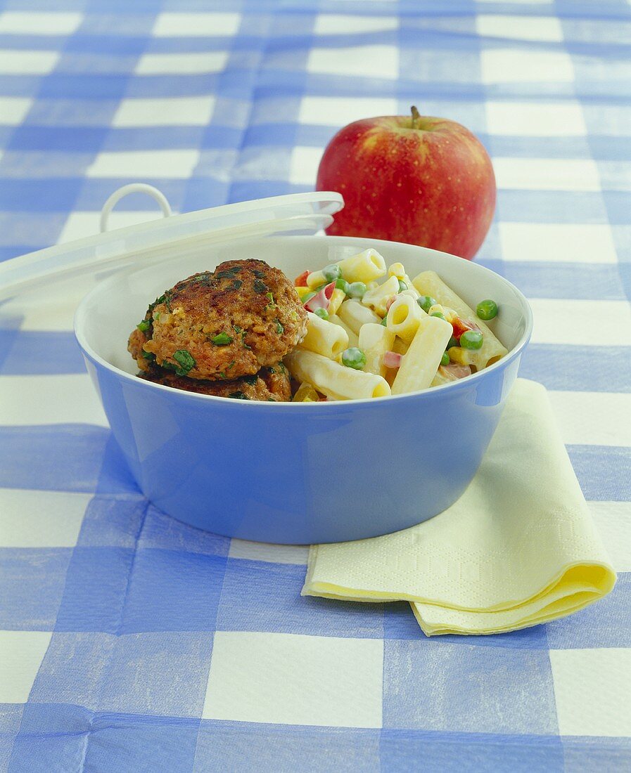 Burgers with pea and pasta salad