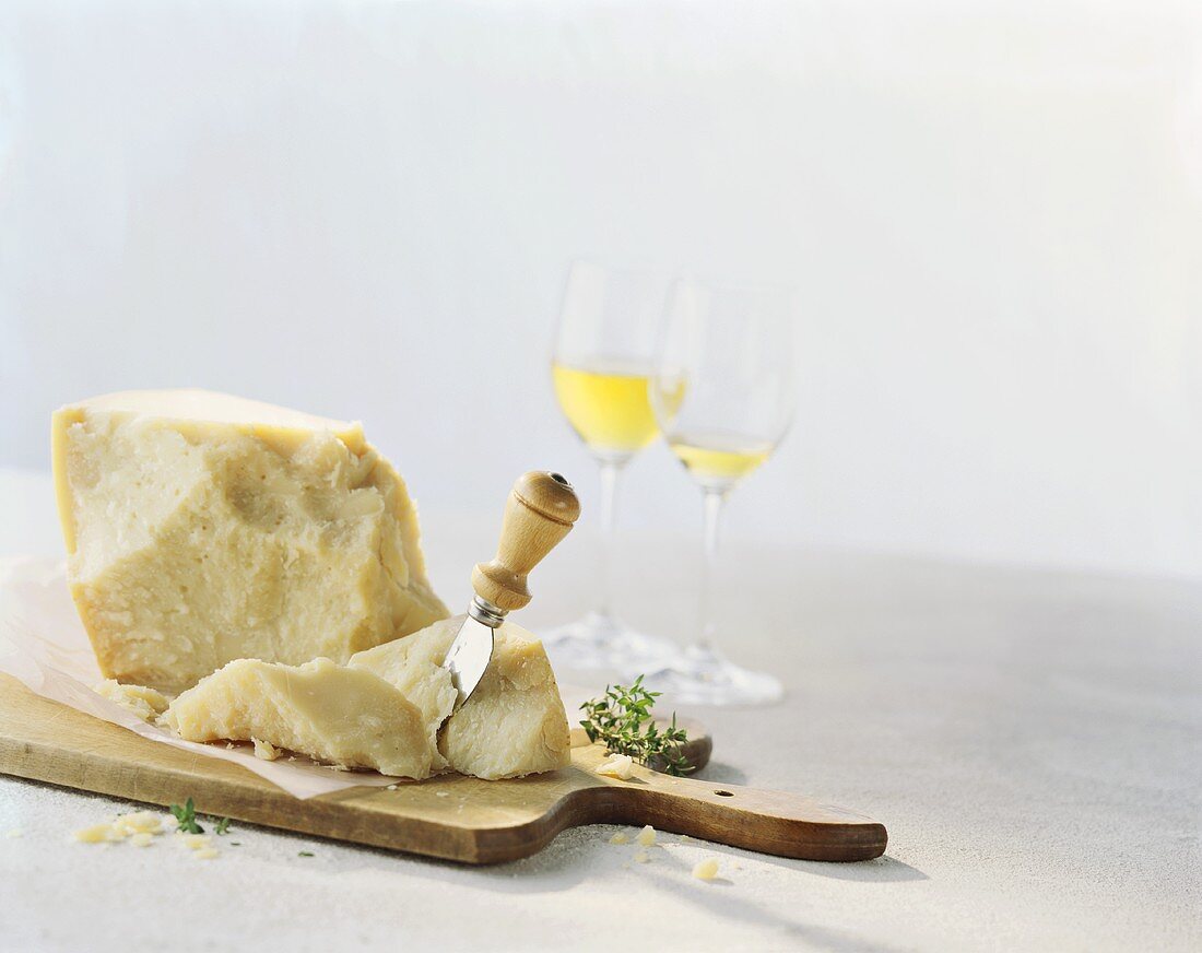 Parmesan with cheese knife and wine