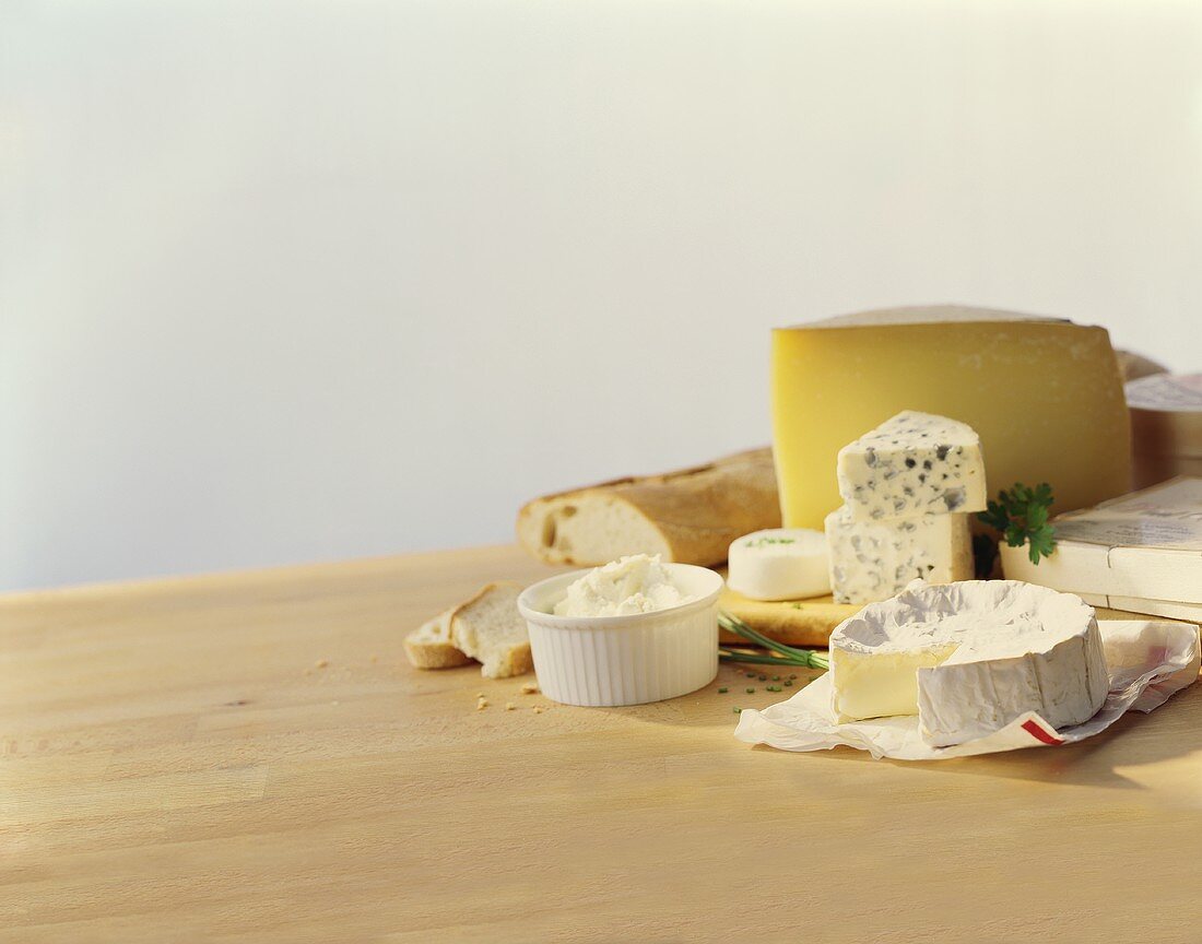 Various types of cheese with baguette