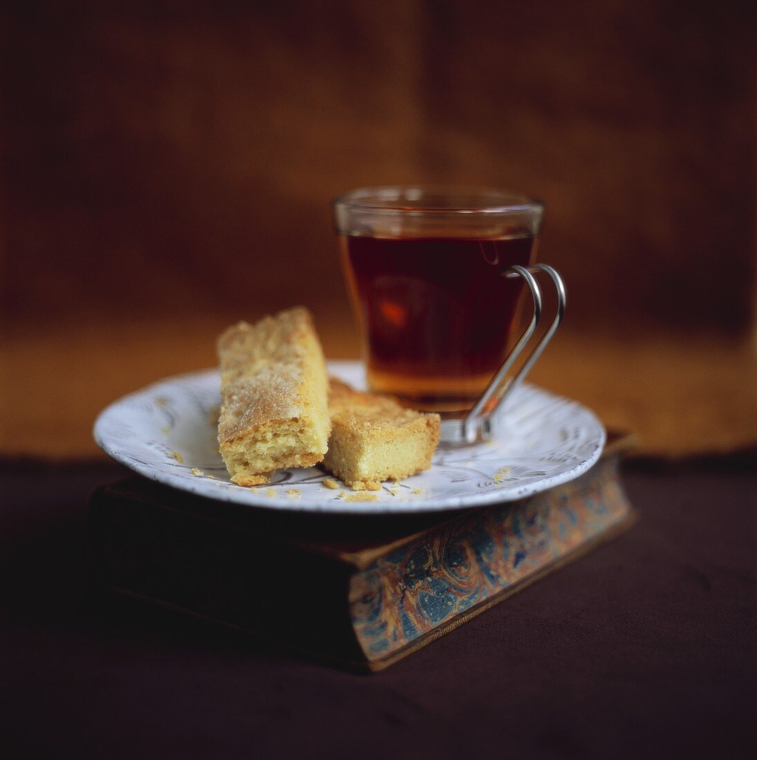 Shortbread and tea in glass cup
