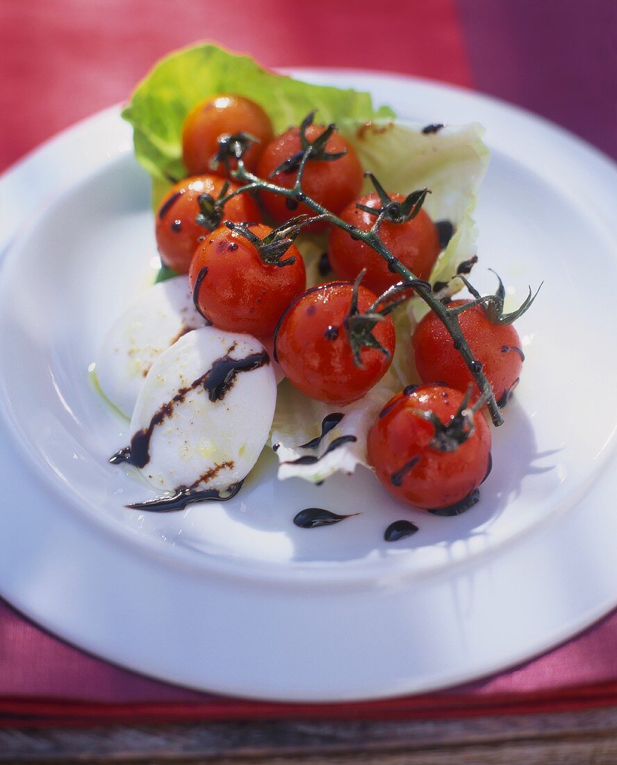 Grilled cocktail tomatoes with mozzarella & balsamic vinegar