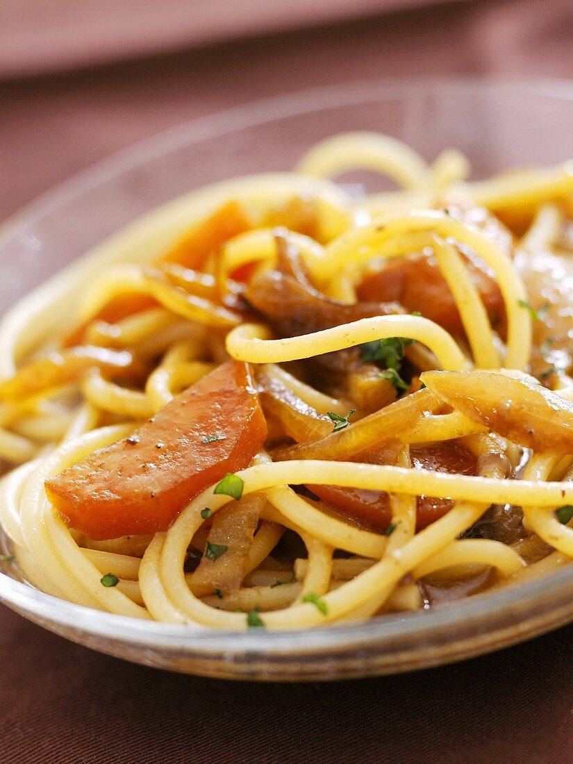 Spaghetti with spicy sauce and carrots
