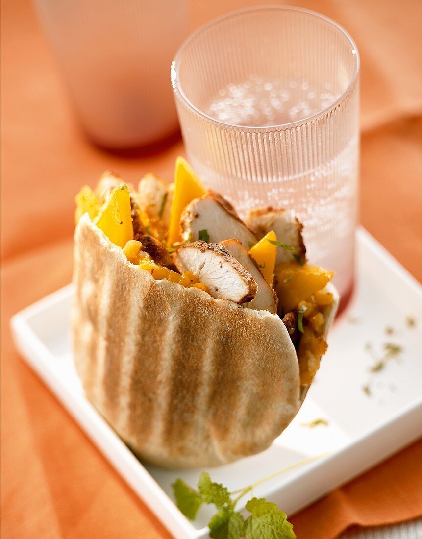 Tandoori chicken and mango in pita bread