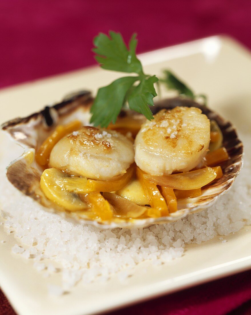 Fried scallops on saffron vegetables