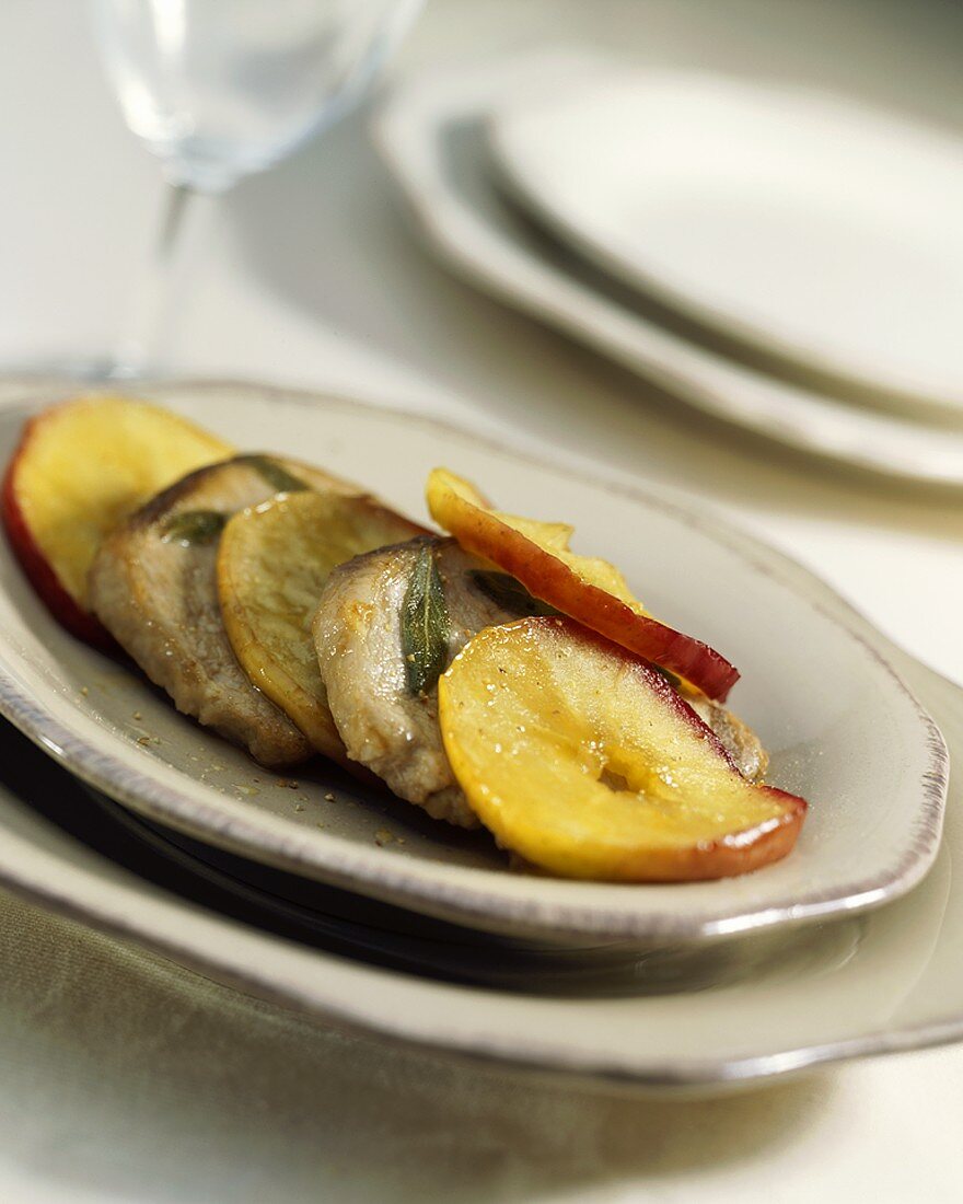 Veal escalopes with apple slices and sage