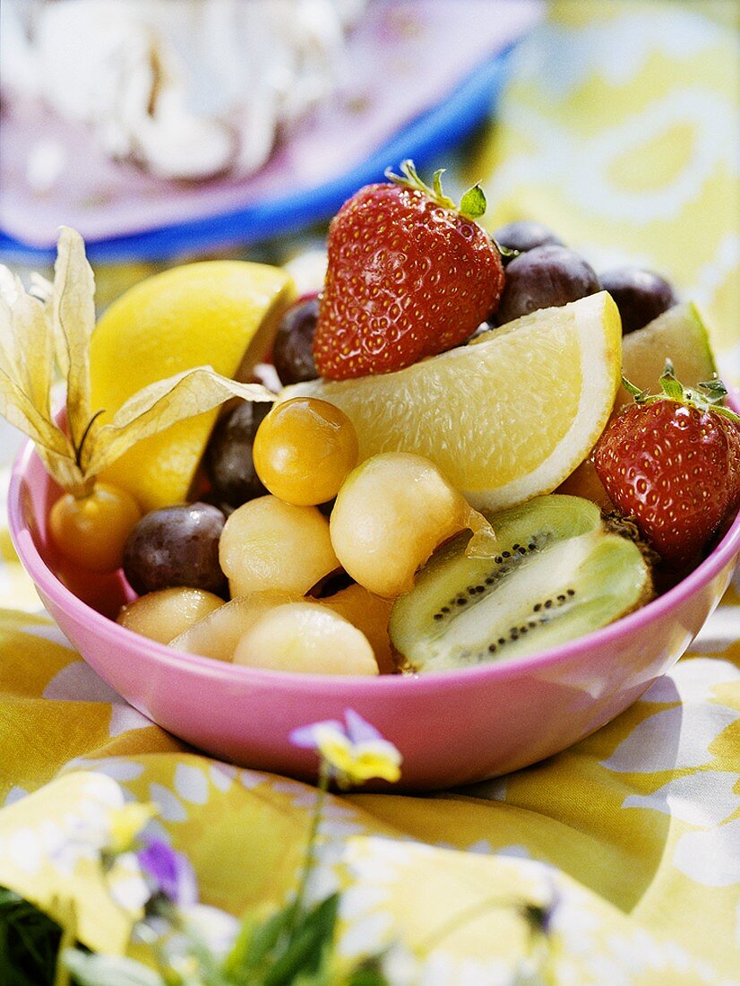 Mixed fruit salad in a small bowl
