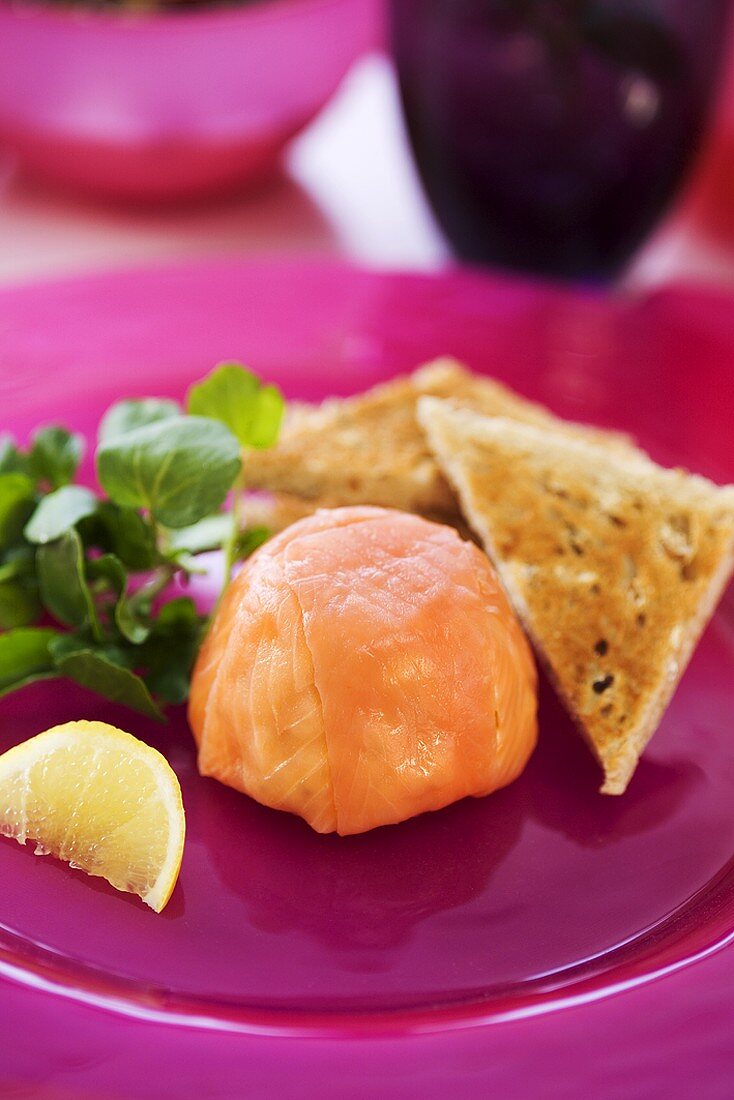Salmon timbale with toast triangles