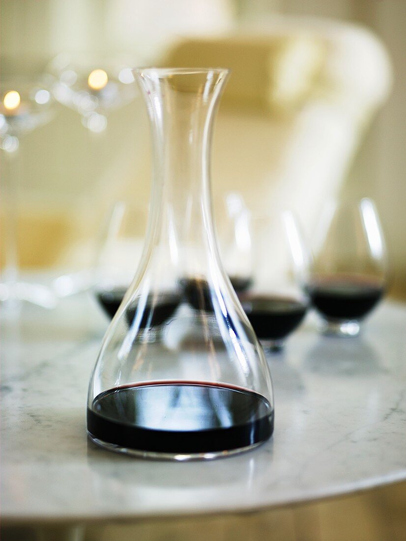 Red wine in a carafe and glasses