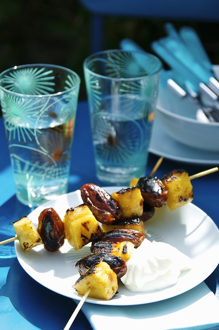 Grilled pineapple and date kebabs with yoghurt