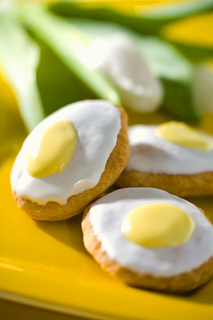 Little cakes with 'fried egg' icing