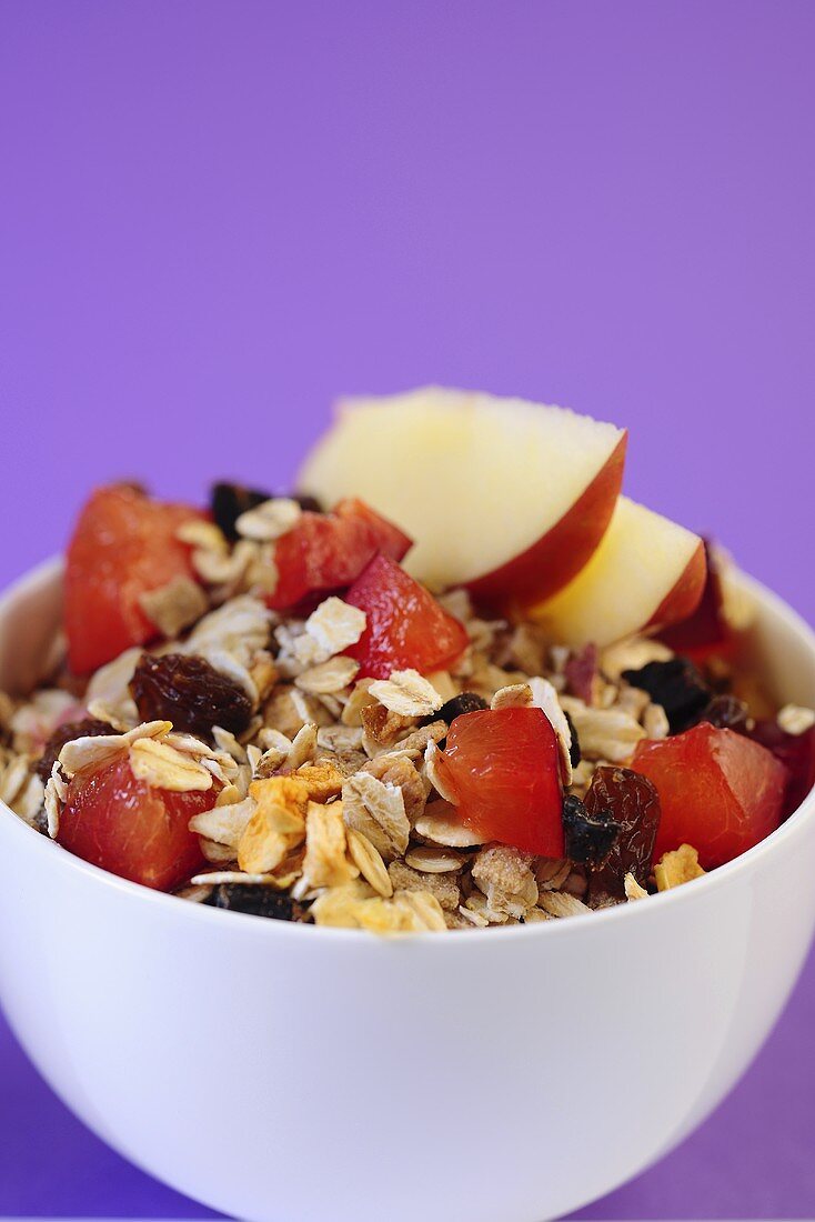 Muesli with plums and apples