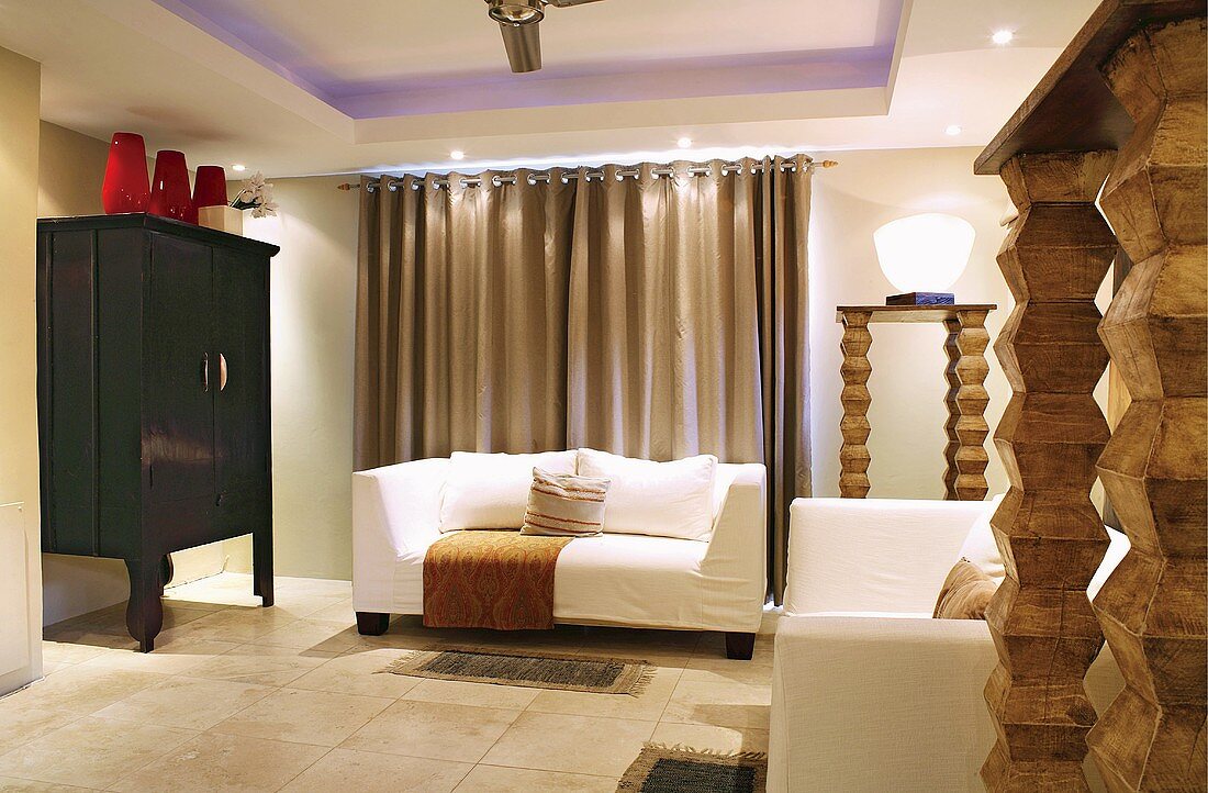 Living room decorated in brown, beige and white