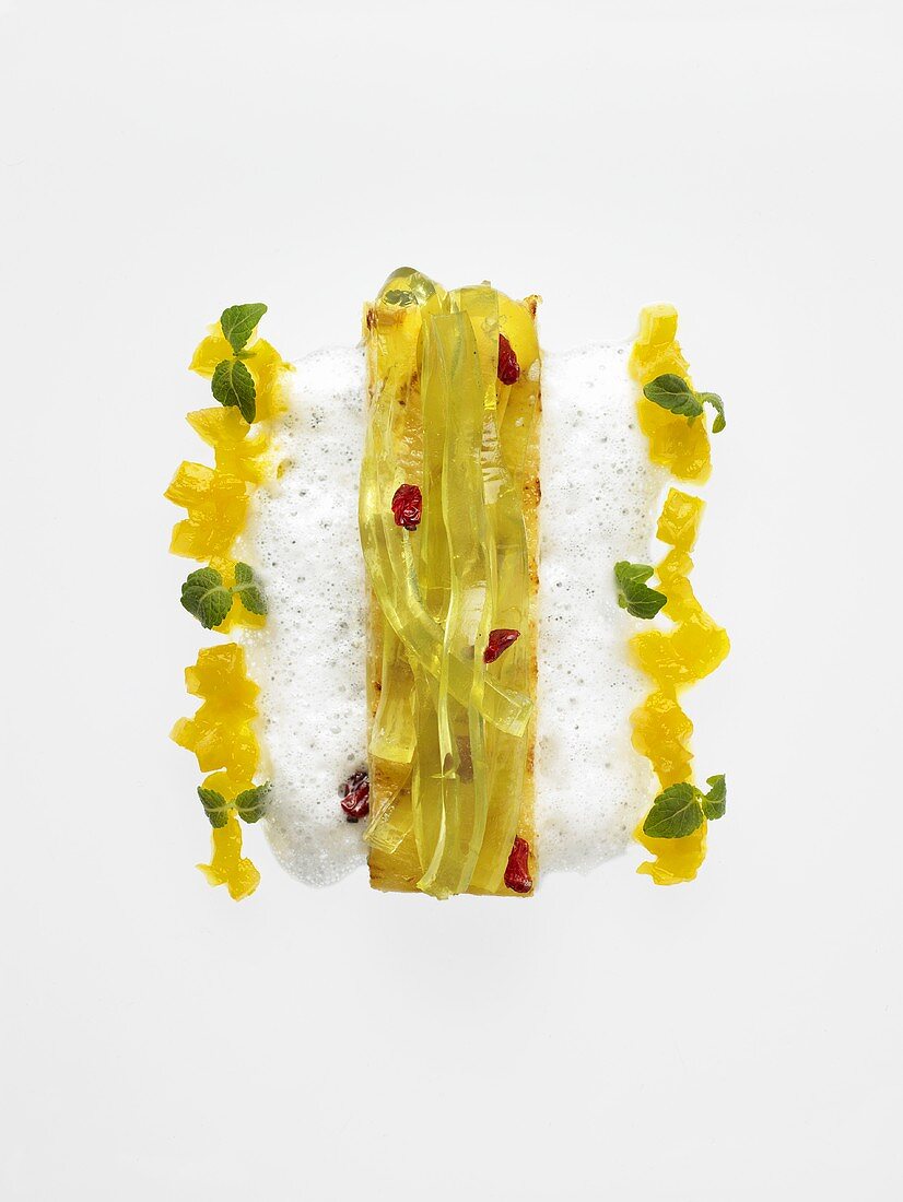 Tea pasta with grilled pineapple and milk foam (molecular gastronomy)