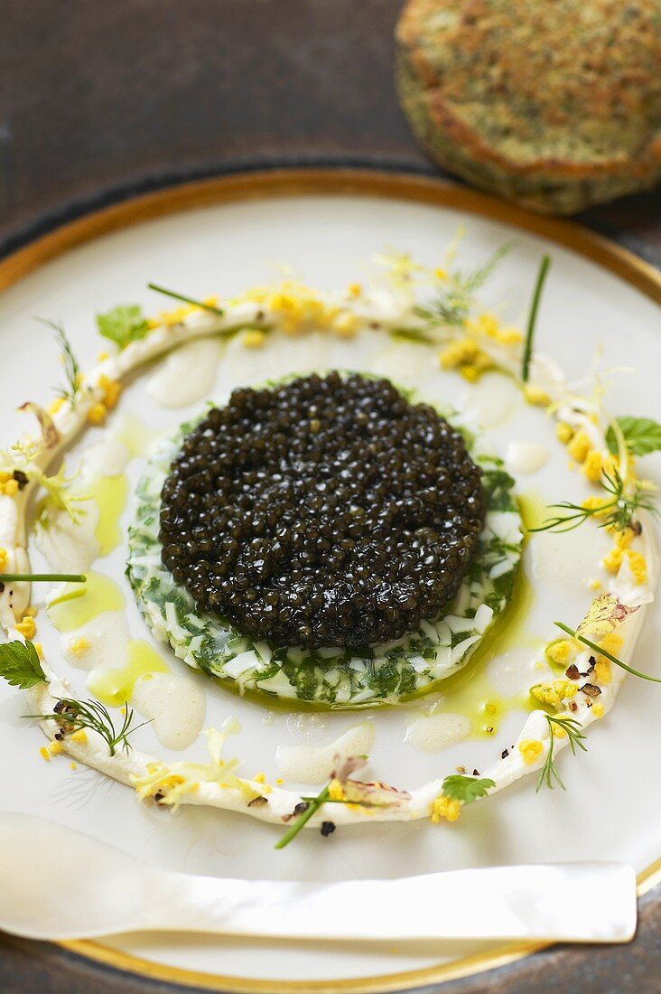Osetra caviar on chive jelly
