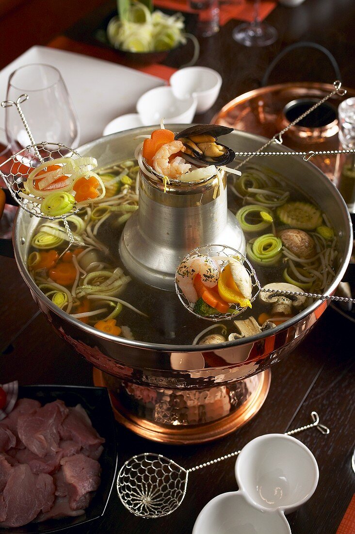 Mongolian pot for Chinese fondue (hot pot)