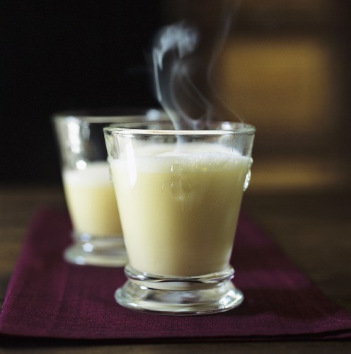 Two glasses of advocaat with hot milk … – License Images – 851007 ❘  StockFood