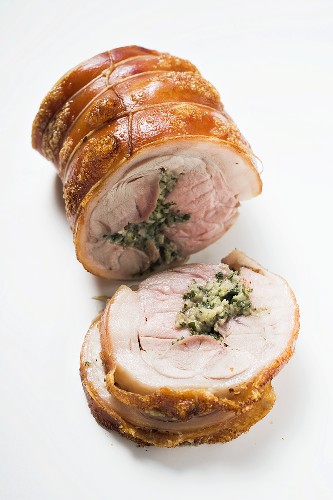 Rolled pork roast with herb stuffing and crackling