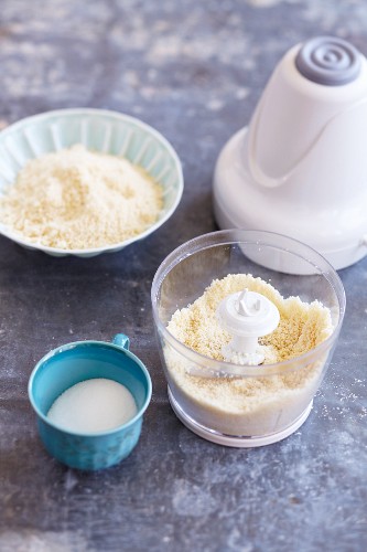 Amarettini being made: chopped almonds in food chopper