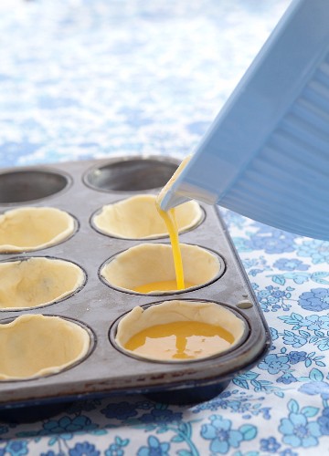 Pasteis de nata (custard tarts, Portugal) being prepared