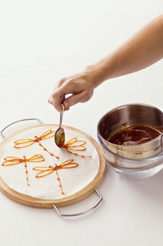 Dragonflies being made from caramel