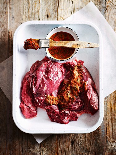 Barbecued leg of lamb with harissa and minted yogurt